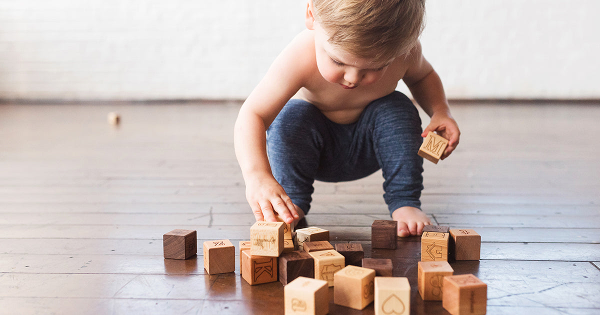 Wooden Toys from Smiling Tree Toys That Promote Child Development From Infancy Through Childhood