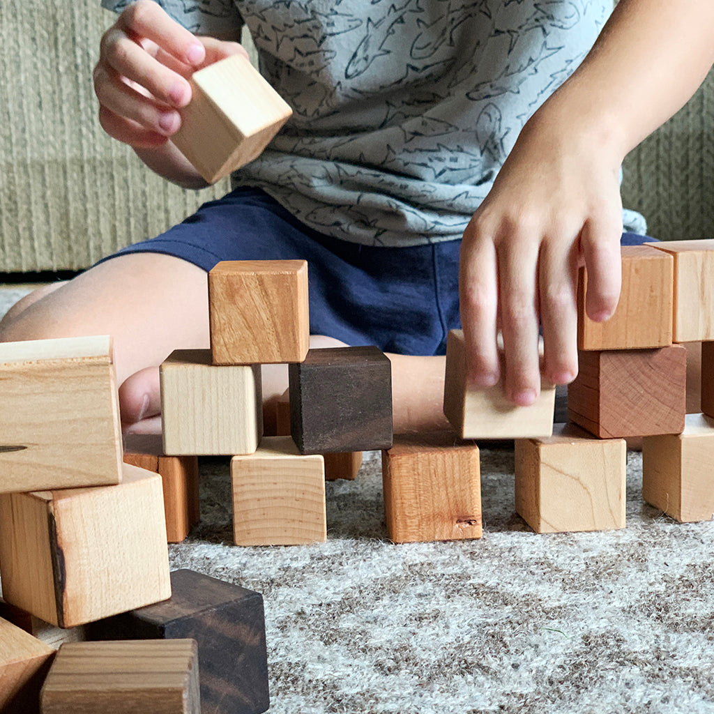 natural wooden blocks in three wood tones minimalist baby toy ecofriendly