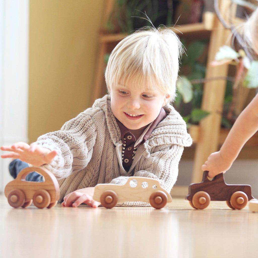 three wooden toy cars and truck set for boys or girls
